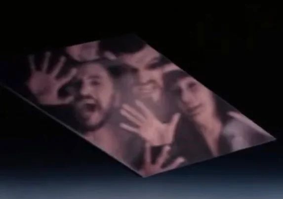 The Phantom Zone criminals flipping through eternity in their little mirror