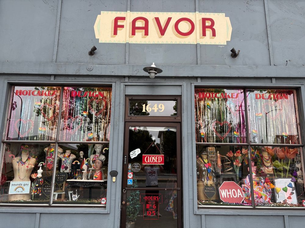 A shop storefront with a sign reading “Favor” over the front door.
