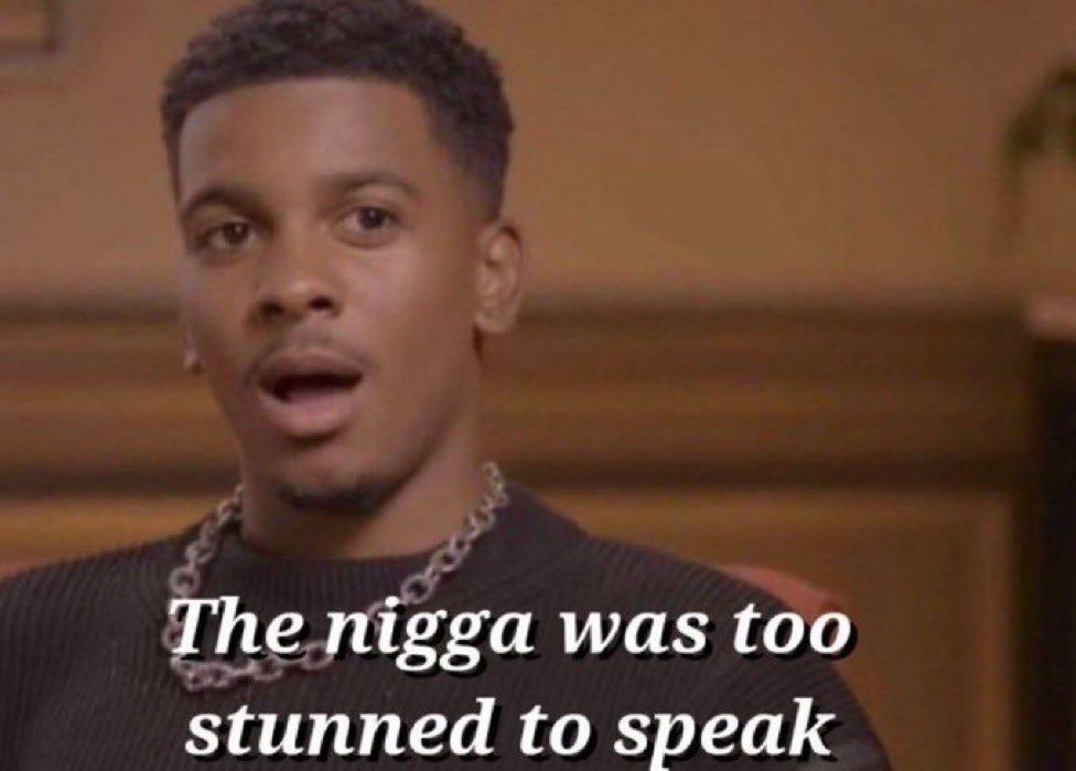 Brett Gray looking stunned by the caucasity he is seeing with the words ' The nigga was too stunned to speak' below him.