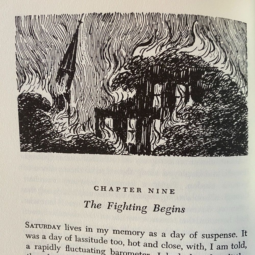 Chapter Nine: The Fighting Begins—The black and white ink illustration shows two buildings covered in wild flames. A steeple topples on the left.