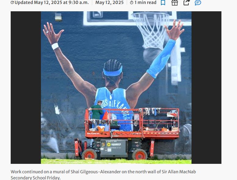 Screenshot from The Hamilton Spectator. Man painting a mural of the back of Shai-Gilgeous Alexander as he gets a basket in a net (text says "Updated May 12, 2025; Work continued on a mural of Shai Gilgeous-Alexander on the north wall of Sir Allan MacNab Secondary School Friday)
