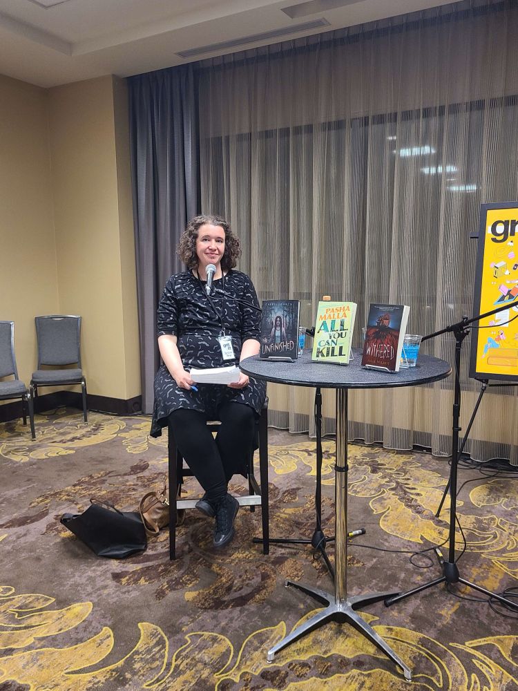 Jessica Peter sits in a conference room at GritLit