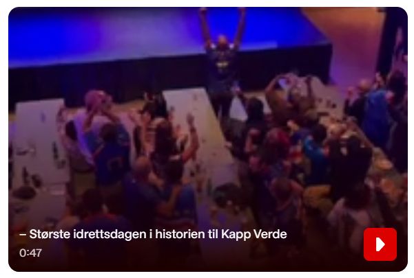 Bilete frå video på VG nett. Jublande folk i noko som ser ut som ein bankettsal. På biletet står teksten: "Største idrettsdagen i historien til Kapp Verde"