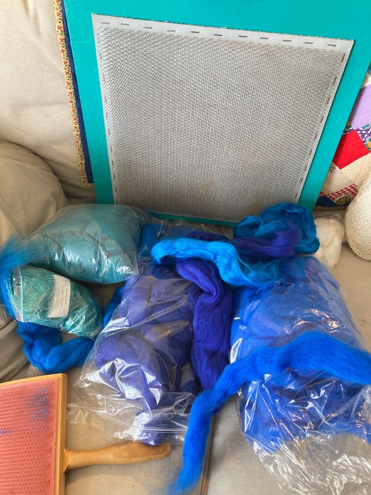 Blending board, card and variety of blue and blue green fibres to make a batt. 