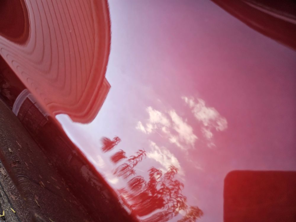 Quarter panel of clean orange car