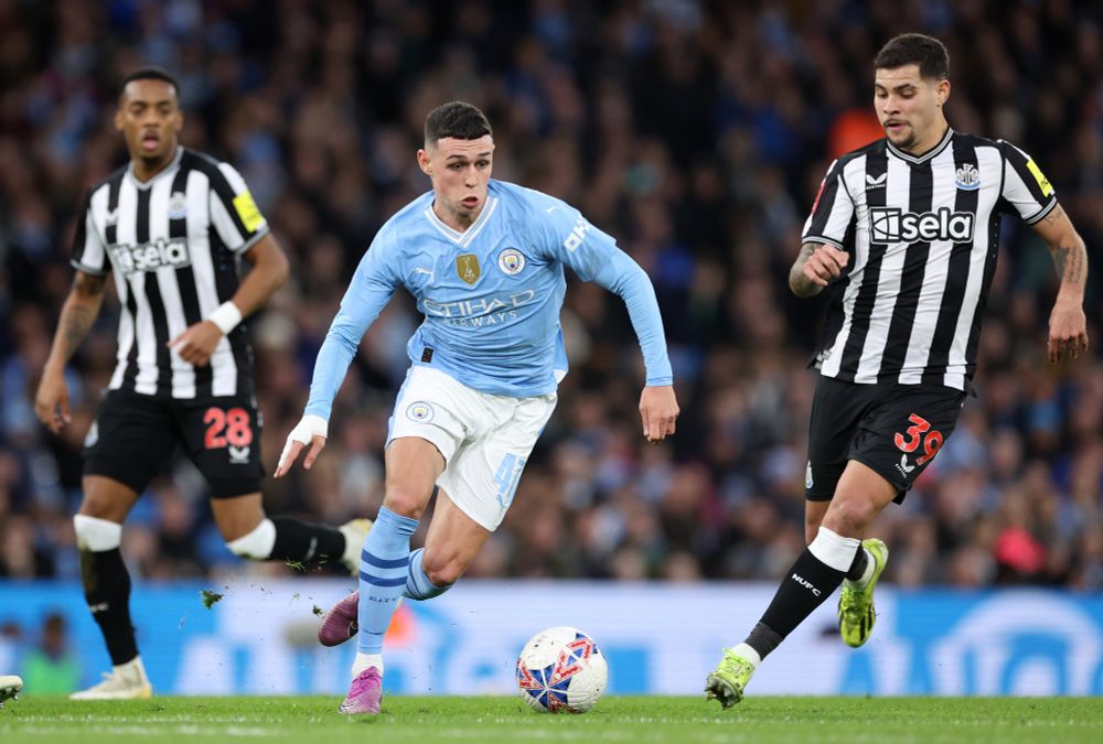 Phil Foden of Man City and Bruno Guimaraes of Newcastle.