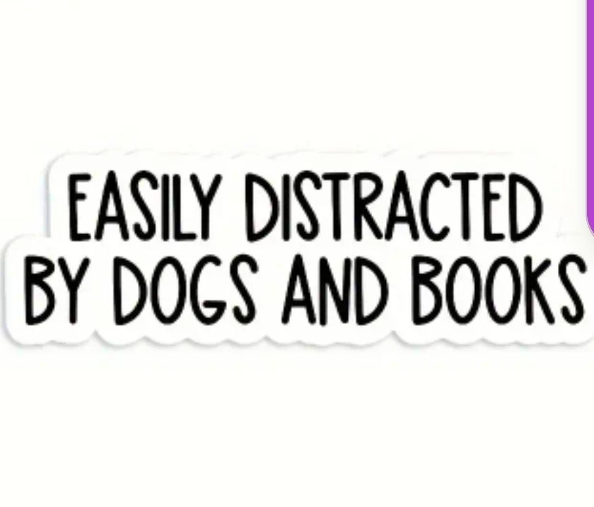 Black and white sticker with words 

"Easily Distracted by dogs and books"
