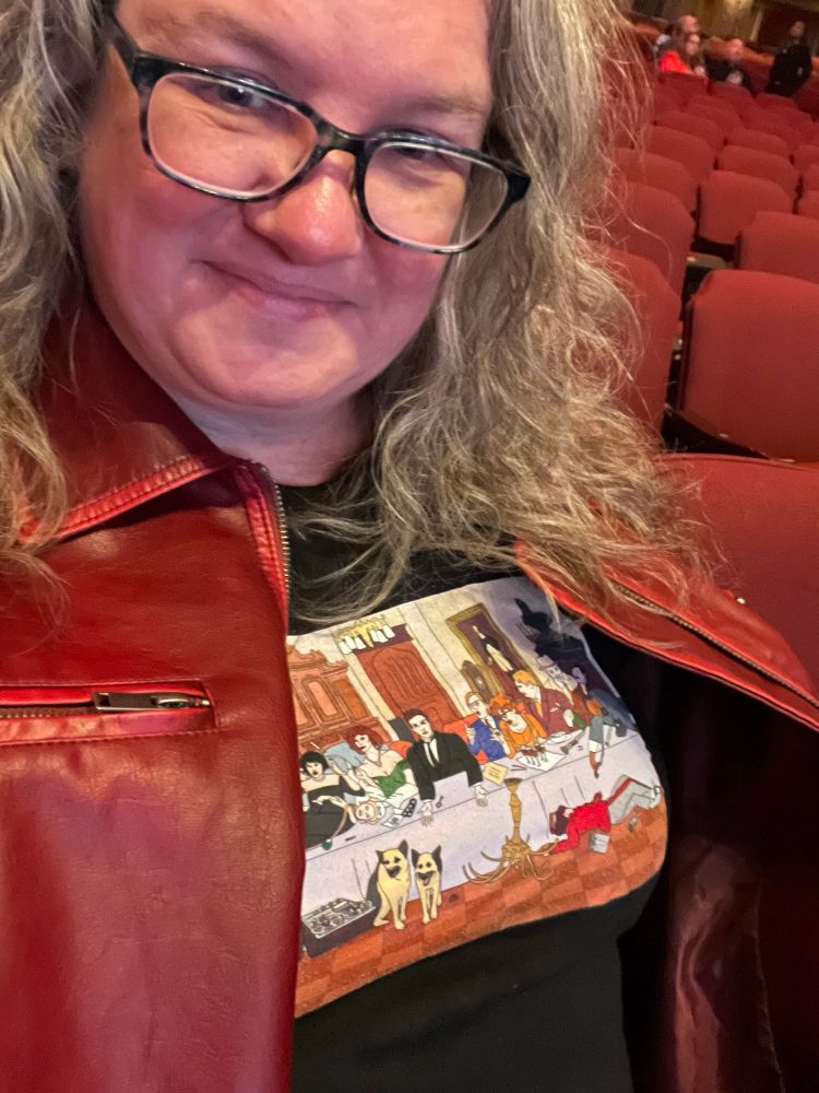 Me in the audience wearing my Clue Last Supper shirt and a red leather jacket in honor of my idol, Miss Scarlet.