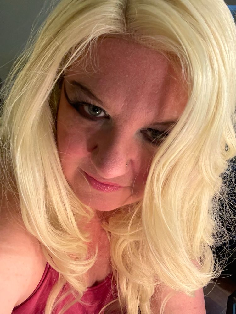 Me in a blonde wig and elaborate eye makeup