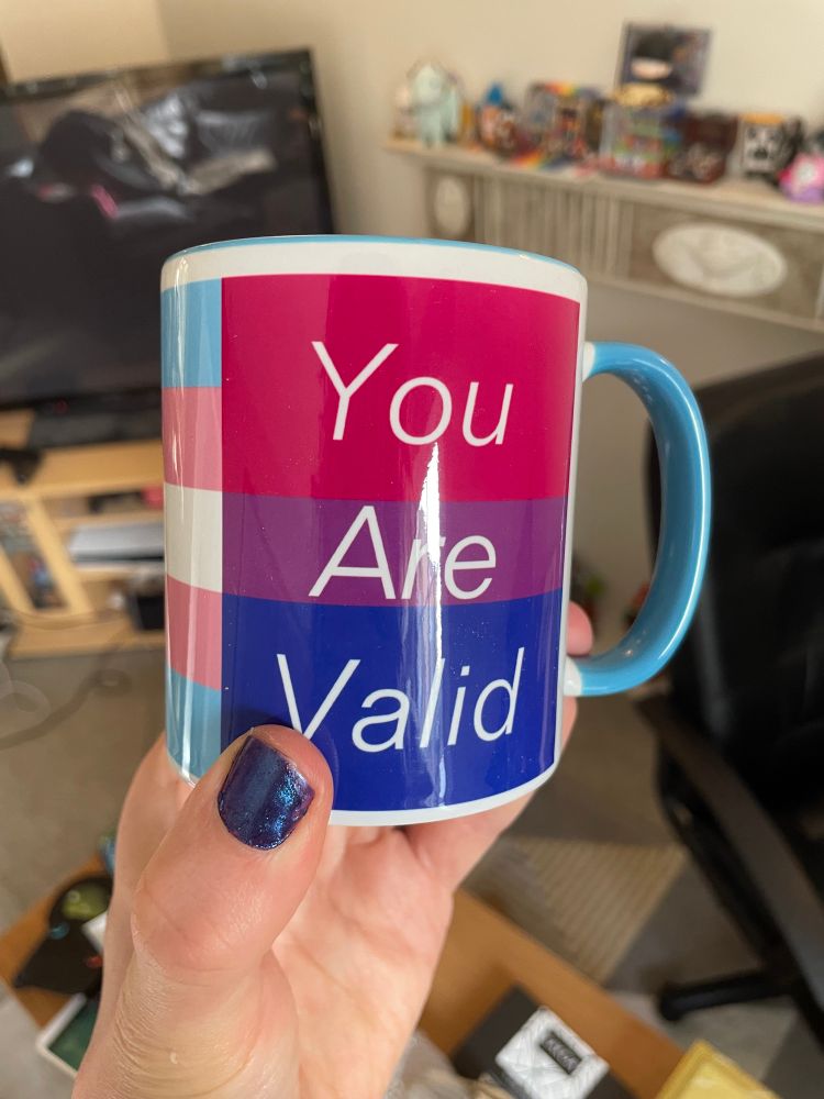 Mug that says “you are valid” on it 