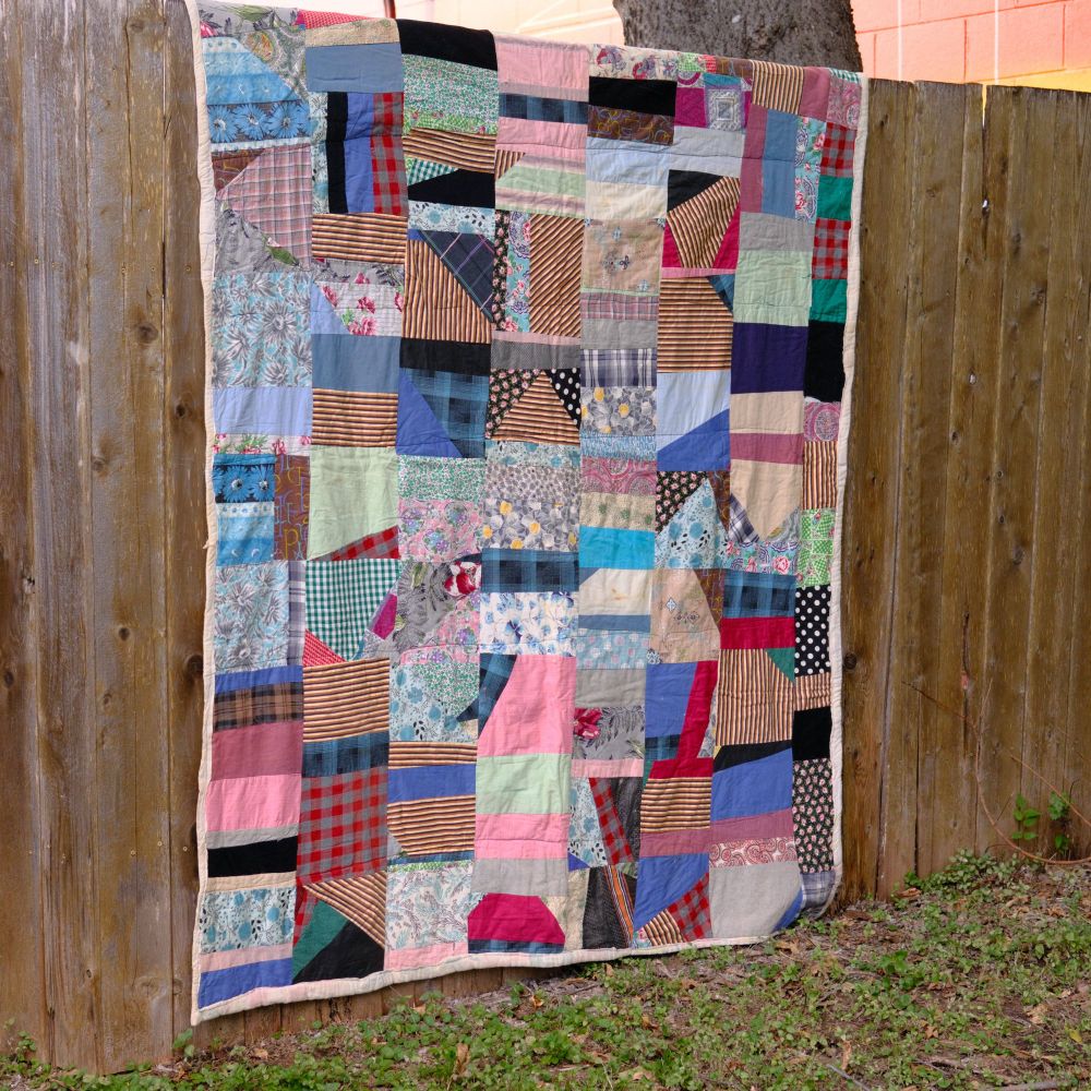 Quilt 1B crazy quilt with fabric from the 30’s to 50’s very heavy 