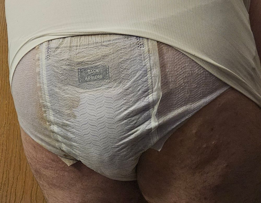 The back of my full purple XXL goodnites. You can see how much they bulge out and brown stains are present around