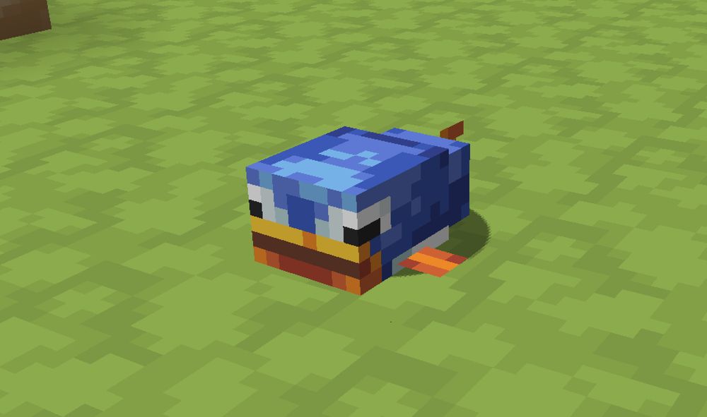 A Minecraft screenshot showcasing a modded mob from the Alex's Mobs mod retextured in a Mario theme. It is a depressureized Blobfish retextured to look like the Rip Van Fish from Super Mario World
