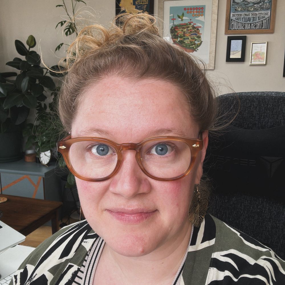 A straight-on selfie of Kelly’s face, showing off her new glasses which are sort of a mottled amber acetate frame. She thinks they make her blue eyes pop.