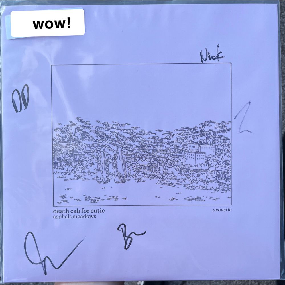 a vinyl copy the acoustic version of death cab for cutie's album "asphalt meadows," signed by the whole band