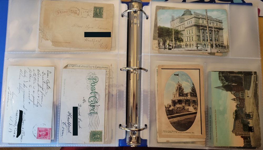 Photo of various post cards from various places in the plastic binder I'm currently using to keep them safe in. The postcards feature photos of places from all over, but one specifically is of Union Square in Norwich CT, showing what it looked like in the early 1900's