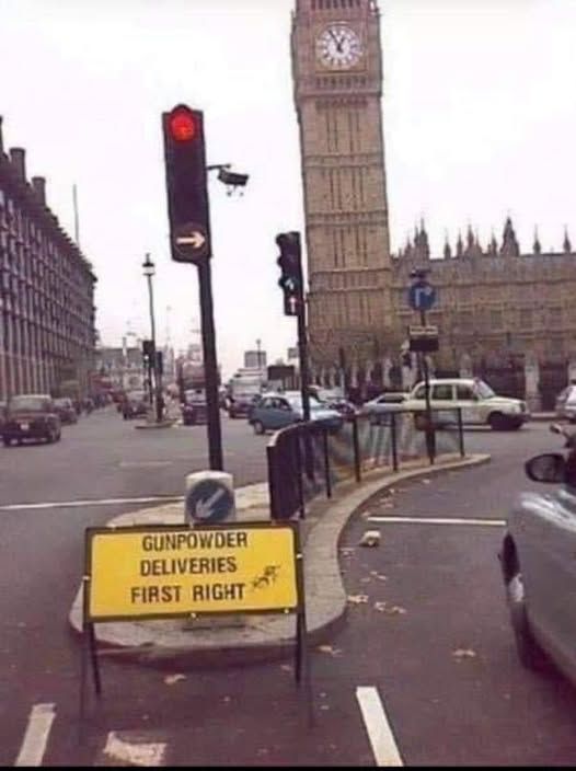 Doctored old photograph of Parliament Square, London, facing the Houses of Parliament; with a sign in front of a traffic light stating "Gunpowder deliveries first right".