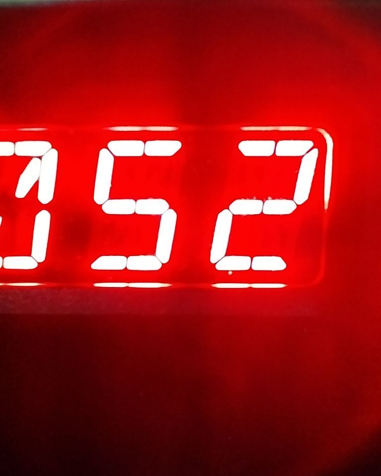 The number 52 as shown on a RED LED panel