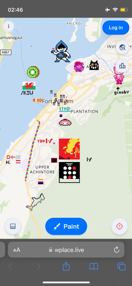 screenshot from wplace.live of various drawings on a map