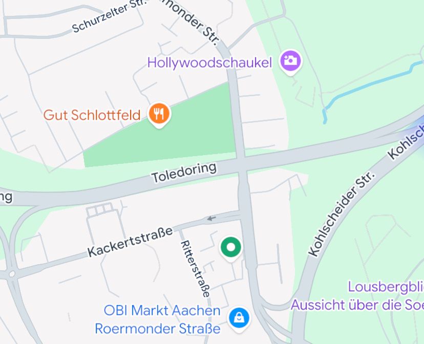 Maps Screenshot depicting some major roads named "Kohlscheider Straße" and "Toledoring", as well as multiple minor streets and POIs 
