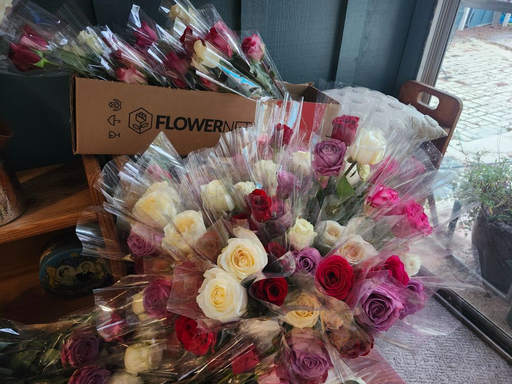 A mixture of beautiful long stemmed roses, in the color of vanilla ice cream to Marilyn Red lips. They are lovely but cutting and bagging is messy, wet and cold, and even the smell gets tiresome after the first 6 dozen.