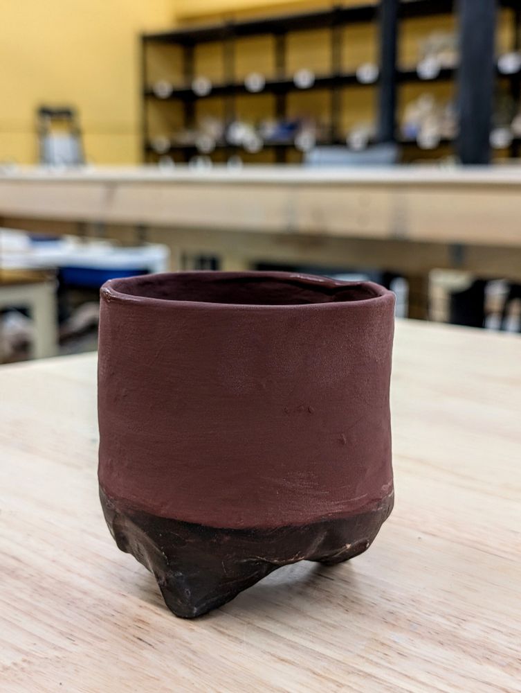 Small, carved/altered piece has a base that I've painted with black underglaze, then all the rest is just plain Ancient Copper. I'm experimenting with painting the bases of pieces with underglaze, as it doesn't stick to the kiln shelves, and it's interesting to me to cover up the white clay body while still having the bottom wax resisted to keep the glaze off. Some of the underglaze has wiped off the bottom since I painted it on after it was bisqued, then waxed it once dry. I don't necessarily mind that on this piece because it's a very organic, rustic piece and the wear could add to that feeling, but in the future I think I'll underglaze the bottoms (if that's the plan for the piece) at the leather hard/bone dry stage, then bisque the underglaze so it doesn't move when wax is applied. 🤓