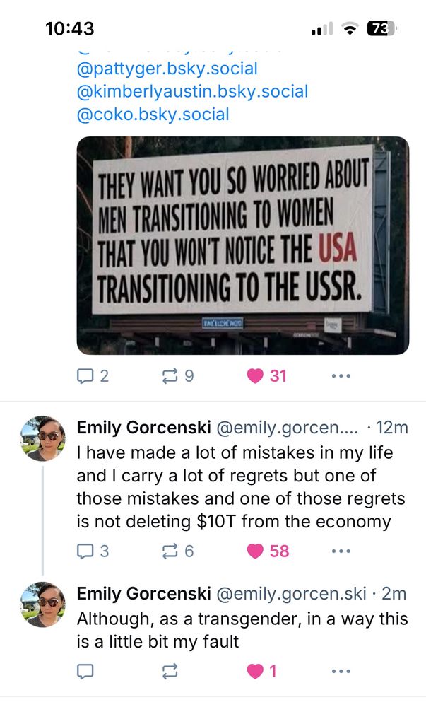 Sign saying: they want you so worried about men transitioning to women that you won’t notice the USA transitioning to the USSR.