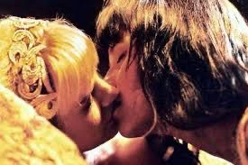 Xena kissing Gabrielle to wake her from slumber, as her one true love….After walking through a sky high eternal flame that burned anyone else who entered the circle. 