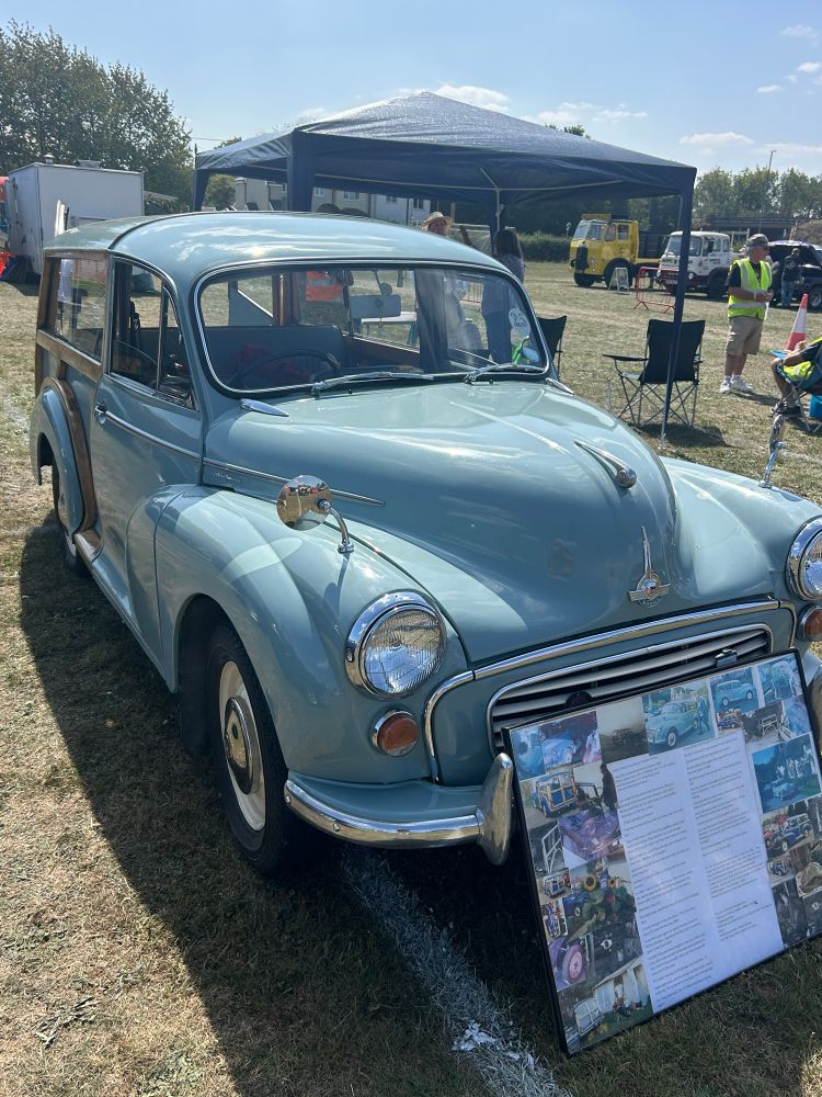 An old Morris Car in a field 