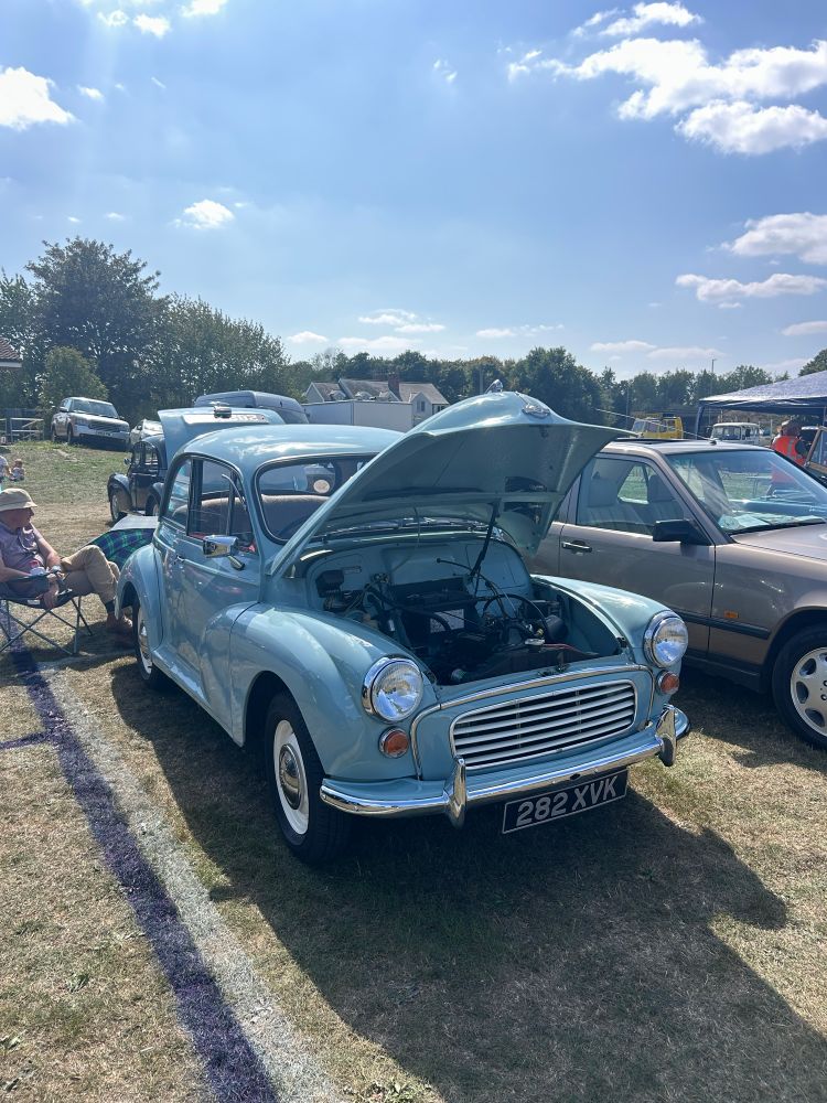 An old Morris Car in a field 