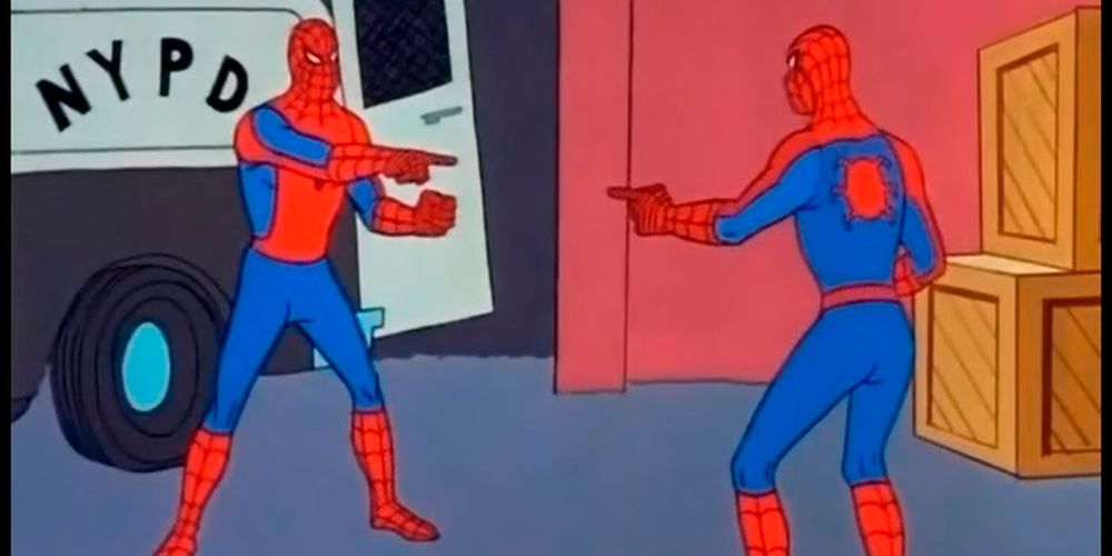 Two Spiderman’s pointing at each other.