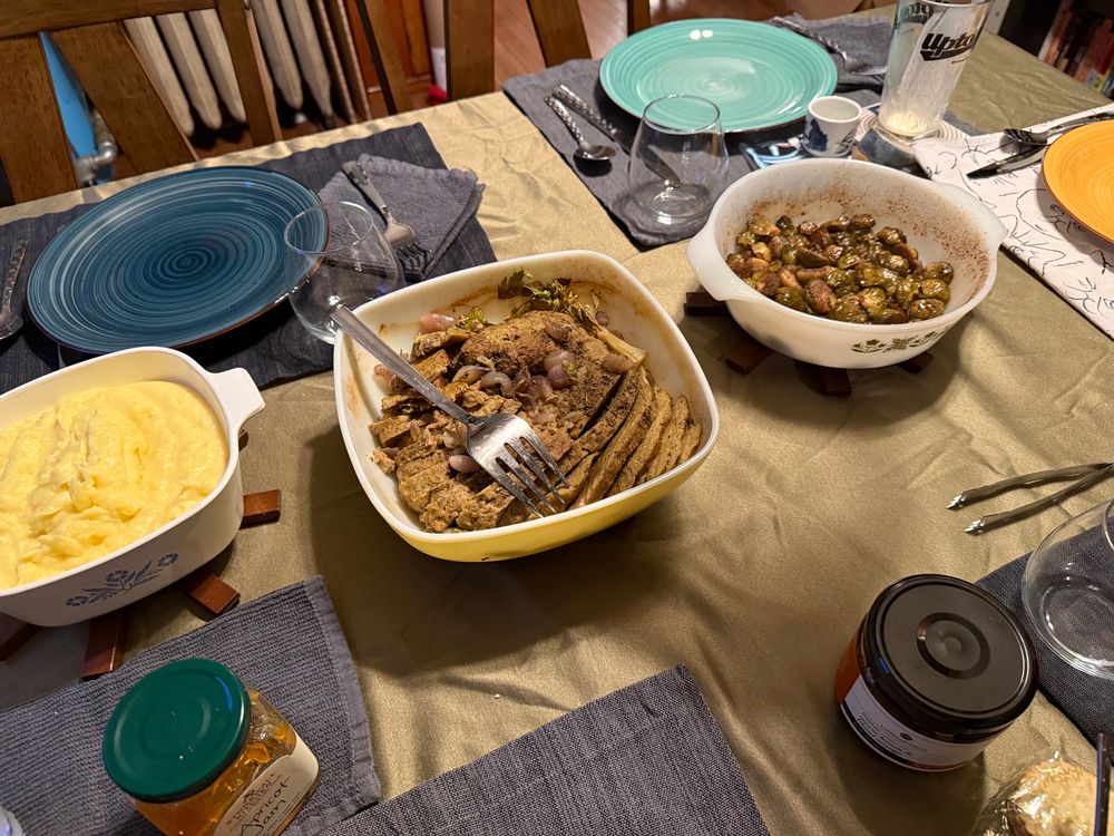 (L to R) Mashed potatoes with cheese, “The Manatee” seitan turkeyesque loaf, Brussels sprout