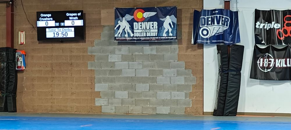 A wall with a suspiciously discolored section. 