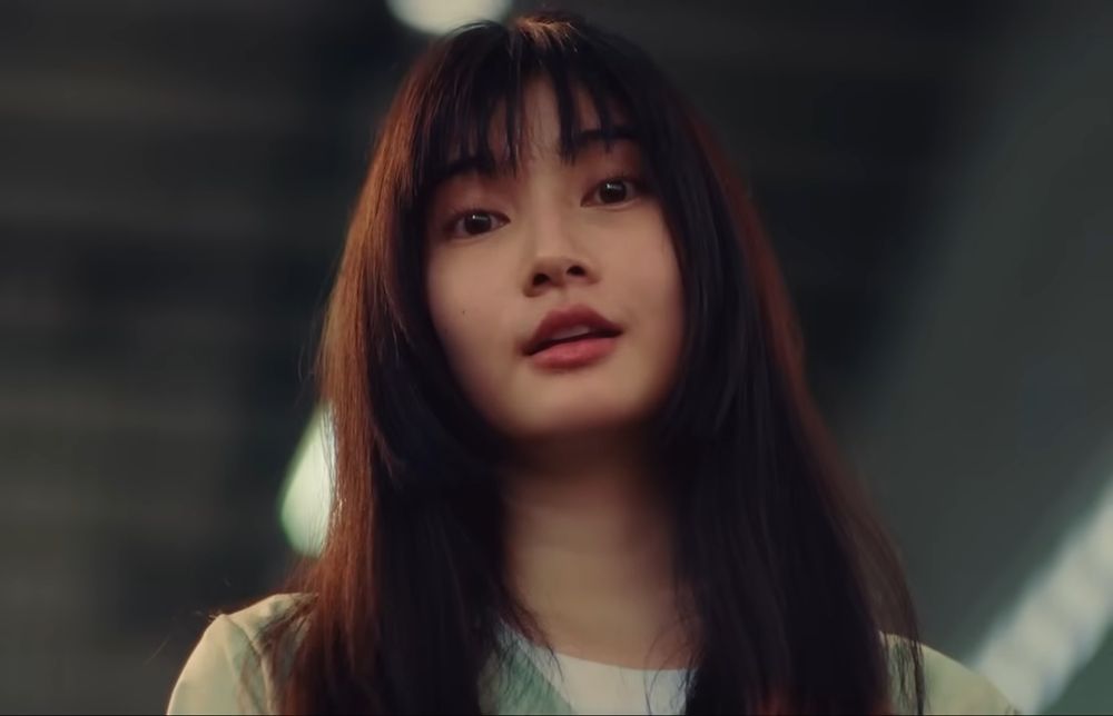 Claire is looking at Bell. This is the first time they have met.