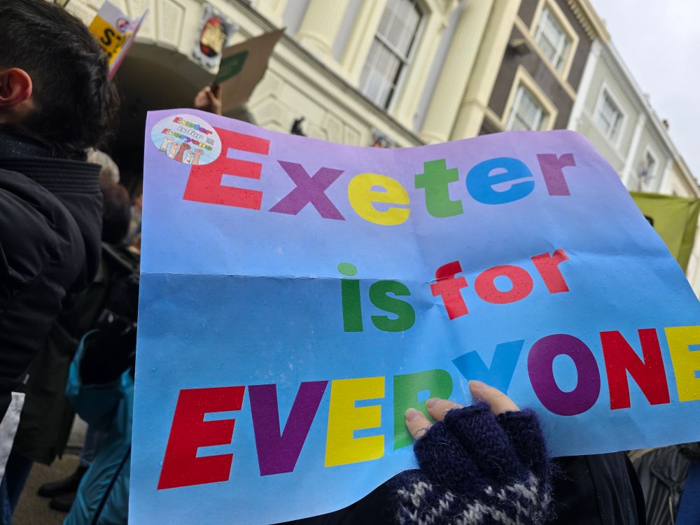 Poster on a march, reading "Exeter is for Everyone"