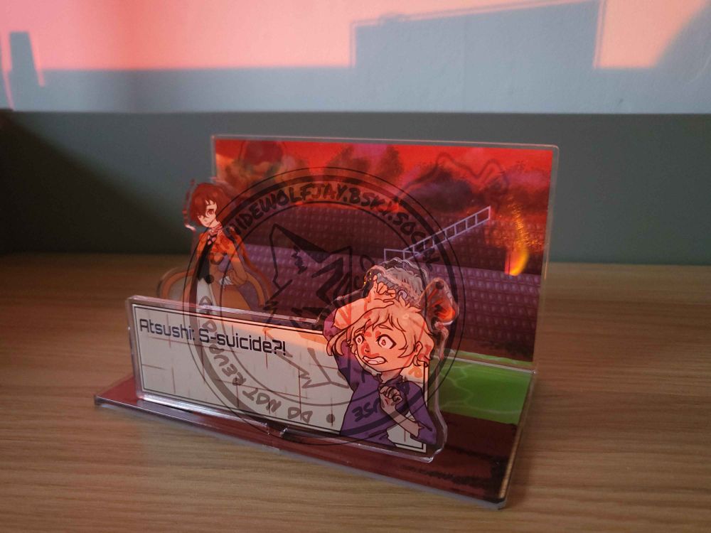 A photograph of the visual novel style diorama standee. The style of this one is called River, as it depicts the river meeting scene between Dazai and Atsushi from Bungo Stray Dogs.