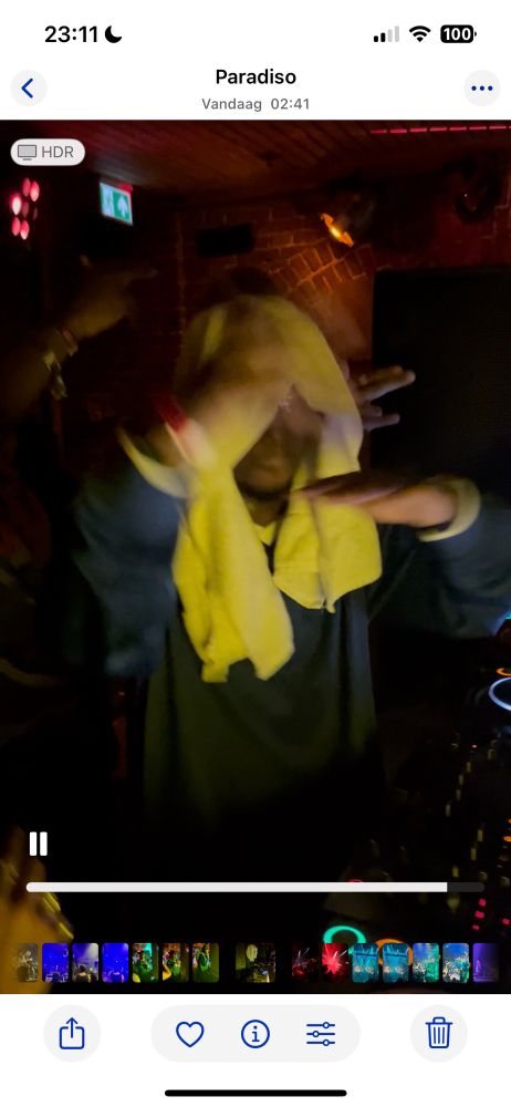 Vanyfox, a white towel over his head, behind the decks, posing ‘til closing