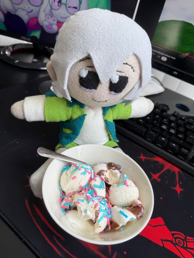 Hakita fumo eating vanilla/chocolate ice cream with light blue and magenta sprinkles