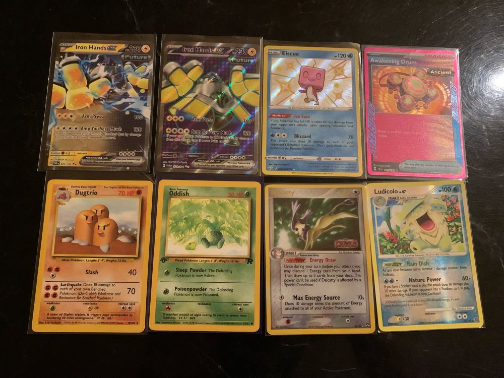 Pokémon Cards: FINALLY GOT STUPID IRON HANDS EX (RIP my wallet 😭), shiny Eiscue pingu babu, Awakening Drum, Dugtrio Base Set, an English froggy Oddish (1st edition too!), Delcatty Power Keepers stamp, Ludicolo (he looks so happy aaa)