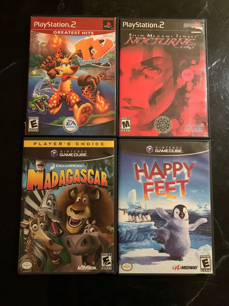 Video Games: Madagascar GC, Happy Feet GC, Ty the Tasmanian Tiger PS2, Shin Megami Tensei III: Nocturne PS2