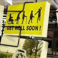 get well soon card with a person in a wheelchair then mobility device then cane then walking then jumping in the air