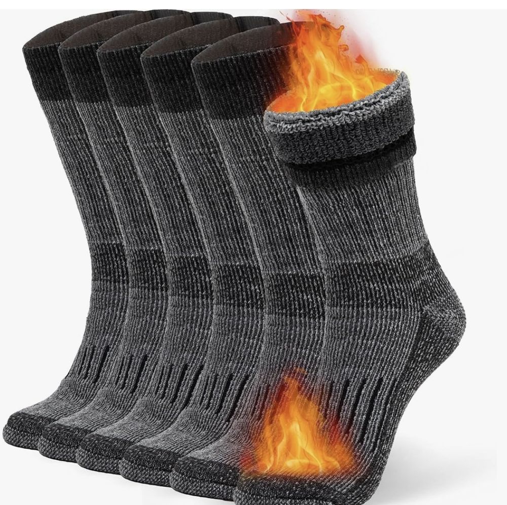 An image of socks that, to show how warm they are, has been edited to make them look like they are on fire