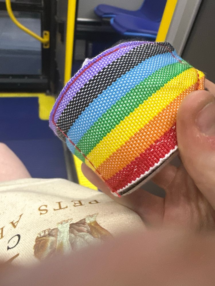 1 boxing wrap with the pride flag printed on it