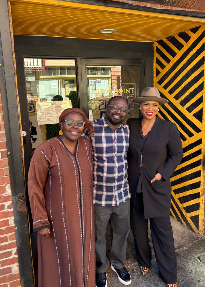 Rep. Ayanna Pressley poses for a photo with Paul Dama. 