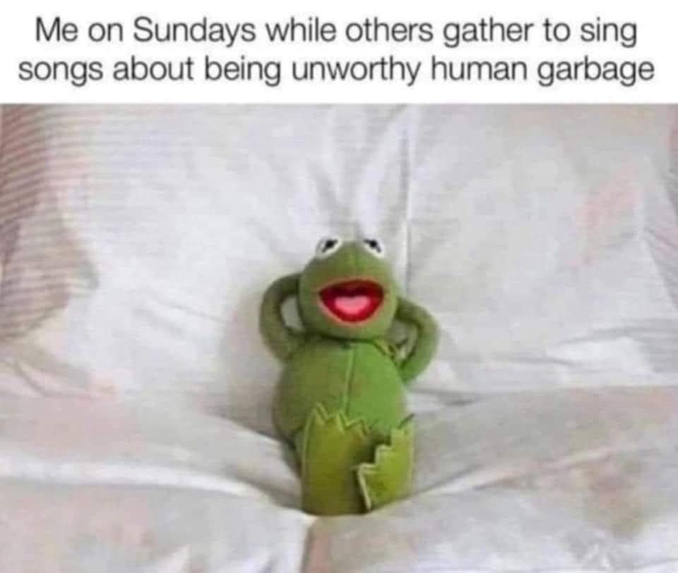 Kermit the frog relaxing in bed, text reads “Me on Sundays while others gather to sing songs about being unworthy human garbage”