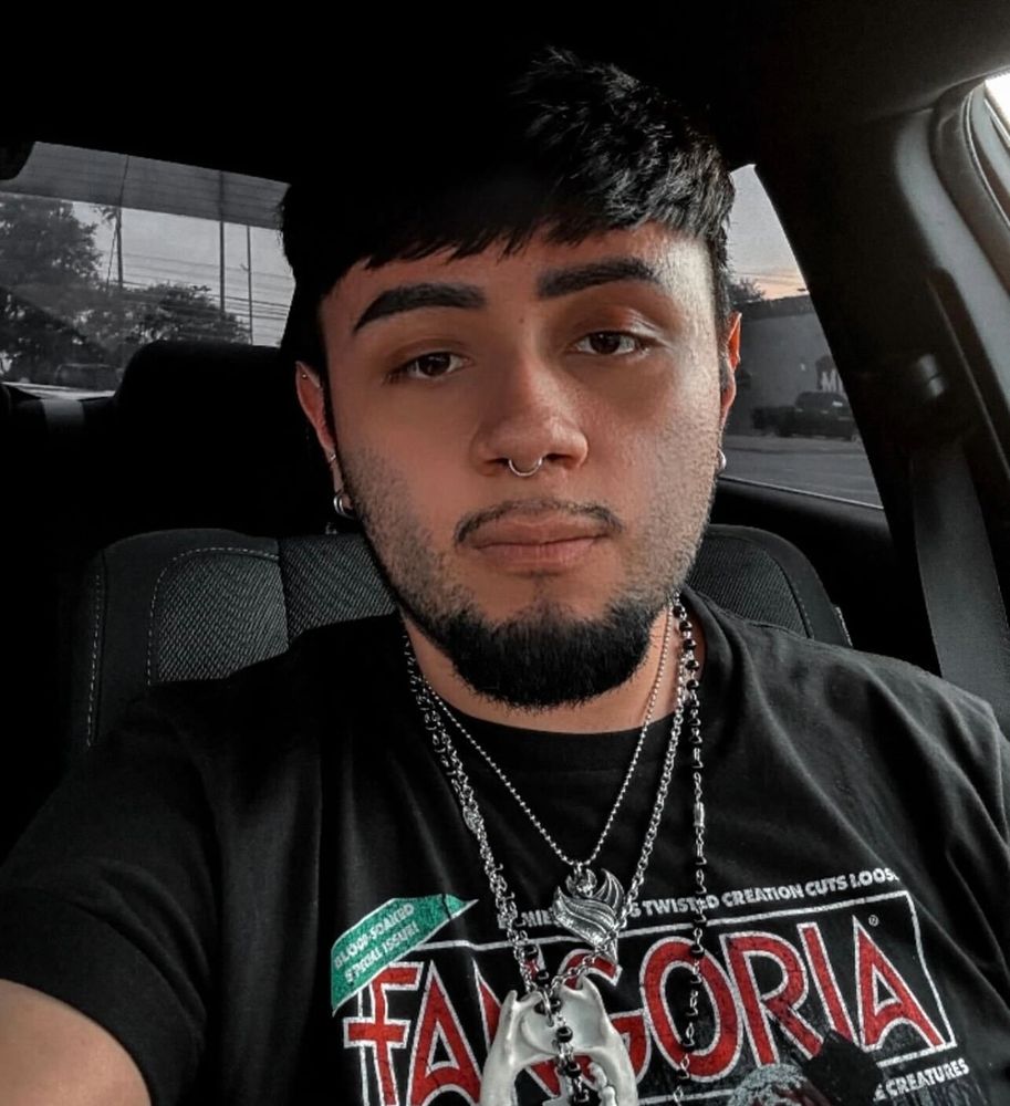 Fango Fan in our TERRIFIER 2 Cover T-Shirt in a car