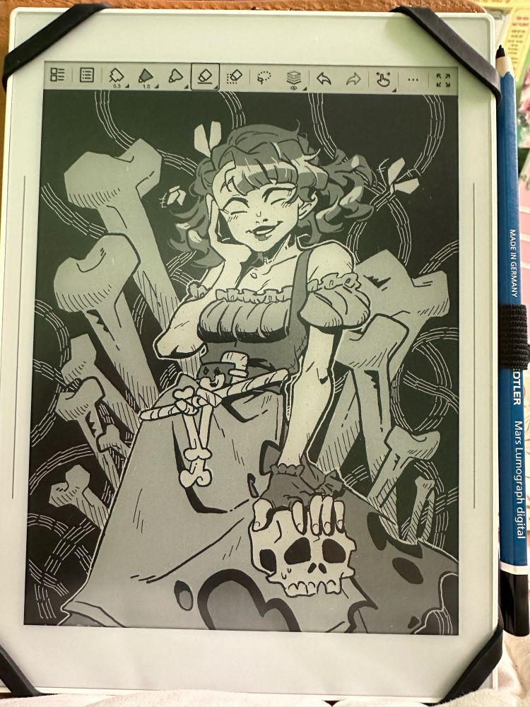 Liana strikes a pose holding onto the top of a skull and surrounded by bones!