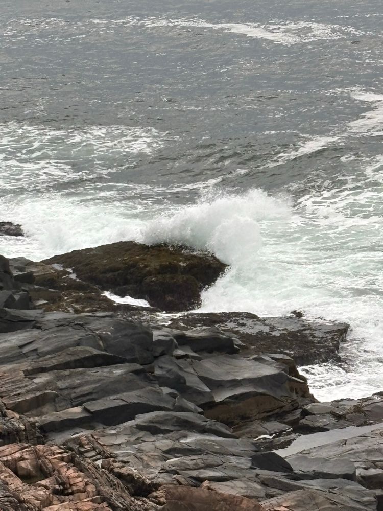 Crashing waves on the rocks outside the restaurant. 