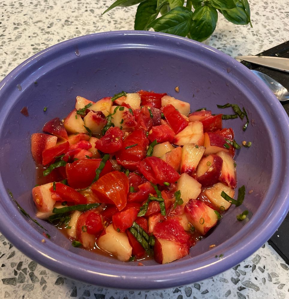 A purple bowl with red garden tomatoes & basil (& chive cause I like it), Hood River white peaches, s & wp, evoo, and bit of white balsamic to set off the sweetness. 