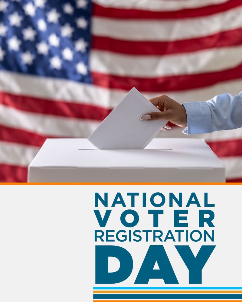 A person casting a ballot into a voting box, with an American flag in the background, commemorating National Voter Registration Day.